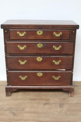 Lot 1403 - Good George II mahogany bachelor’s chest with fold-over top, four long 
graduated drawers with original brass handles on bracket feet