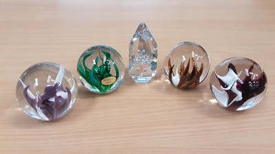 Lot 1329 - Five Wedgwood paperweights, circa 1970's, four sea fern and one clear Galaxy (5)