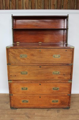 Lot 1405 - Unusual 19th century mahogany military campaign chest in two 
sections, with hinged top forming a two-tiered shelved back, fitted 
secretaire drawer and three drawers below