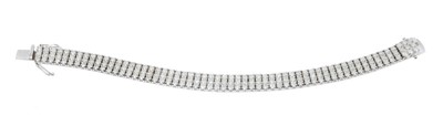 Lot 433 - Diamond line bracelet in 18ct white gold setting