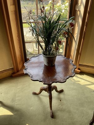Lot 1315 - Georgian mahogany and later carved tripod table
