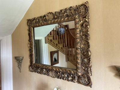 Lot 1322 - Antique baroque giltwood and gesso framed wall mirror