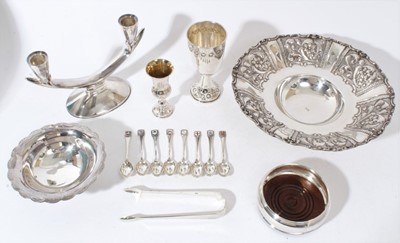Lot 330 - Group of silver and white metal items to include an eastern white metal pedestal dish, two branch candelabra, silver wine bottle coaster, silver bon bon dish, 8 spoons and two goblets