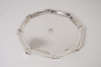 Lot 200 - 1930s silver salver of shaped circular form with engraved armorial by Roberts and Belk