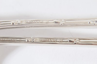 Lot 229 - Pair of American Sterling silver sauce ladles by Tiffany & Co