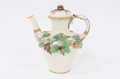 Lot 133 - 19th century continental floral encrusted tea/coffee pot, of a fine porcelain body