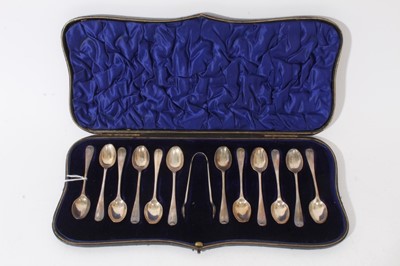 Lot 307 - Cased set of twelve silver Hanoverian Rattail pattern coffee spoons, with matching sugar tongs
