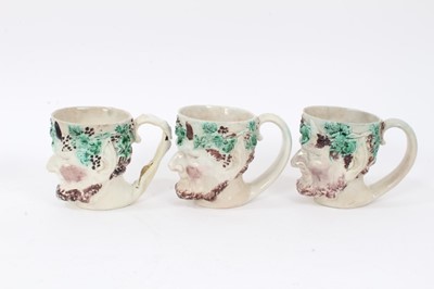 Lot 12 - Group of nine 18th and early 19th century Staffordshire Satyr-mask jugs, including Whieldon and Pratt type examples, 9cm to 12.5cm high