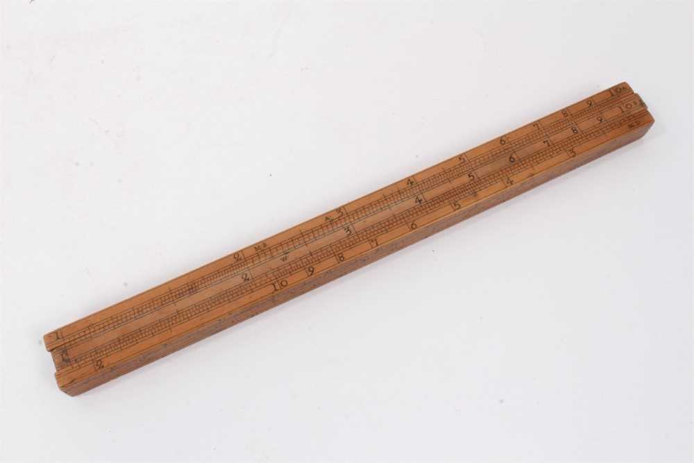 Lot 828 - Rare 18th century boxwood rule with three slides, each with measurements, the removeable rules with Ale, Wine, Malt etc, measurements for use by Customs & Excise in the brewery trade. Stamped 'E. R...
