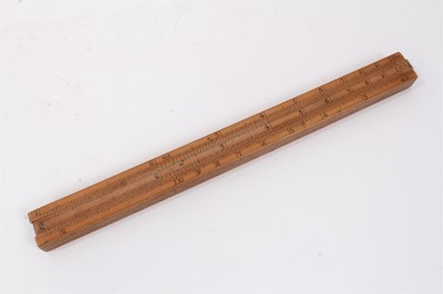 Lot 828 - Rare 18th century boxwood rule with three slides, each with measurements, the removeable rules with Ale, Wine, Malt etc, measurements for use by Customs & Excise in the brewery trade. Stamped 'E. R...