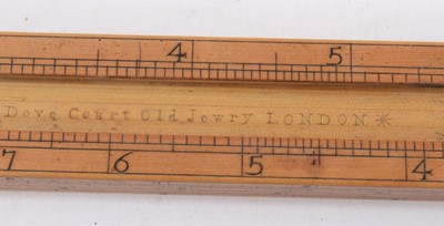 Lot 828 - Rare 18th century boxwood rule with three slides, each with measurements, the removeable rules with Ale, Wine, Malt etc, measurements for use by Customs & Excise in the brewery trade. Stamped 'E. R...