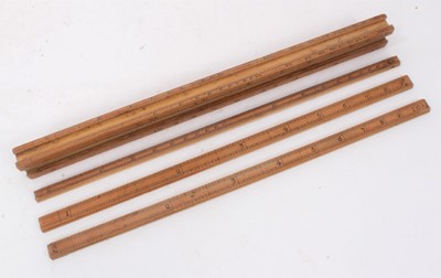Lot 828 - Rare 18th century boxwood rule with three slides, each with measurements, the removeable rules with Ale, Wine, Malt etc, measurements for use by Customs & Excise in the brewery trade. Stamped 'E. R...