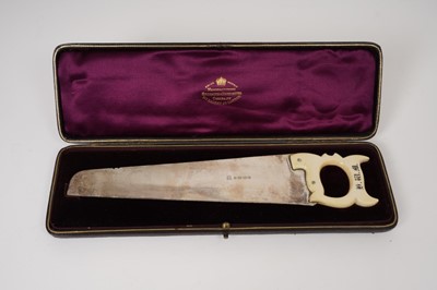Lot 253 - Exceptionally large Victorian silver cucumber saw, with carved ivory handle baring initials H.W.M.