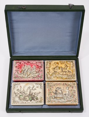 Lot 814 - Cased set of four early 18th century French ivory gaming boxes of rectangular form, each with penwork decoration depicting amorous scenes and sayings and containing a quantity of gambling chips and...