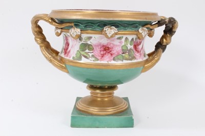 Lot 50 - Large English porcelain urn-type vase, early to mid 19th century, twin-handled on a square base, polychrome painted with roses on a green ground with gilt highlights, 24cm high