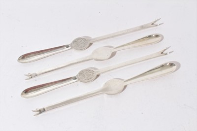 Lot 236 - Pair of  late Victorian silver lobster picks, (London 1897) Together with another pair