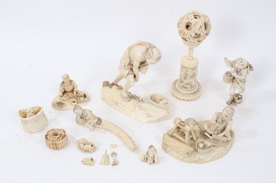 Lot 224 - Chinese export carved ivory puzzle ball, 5.5cm diameter, raised on pierced and carved stand, together with a group of Japanese ivory okimo, with missing elements
