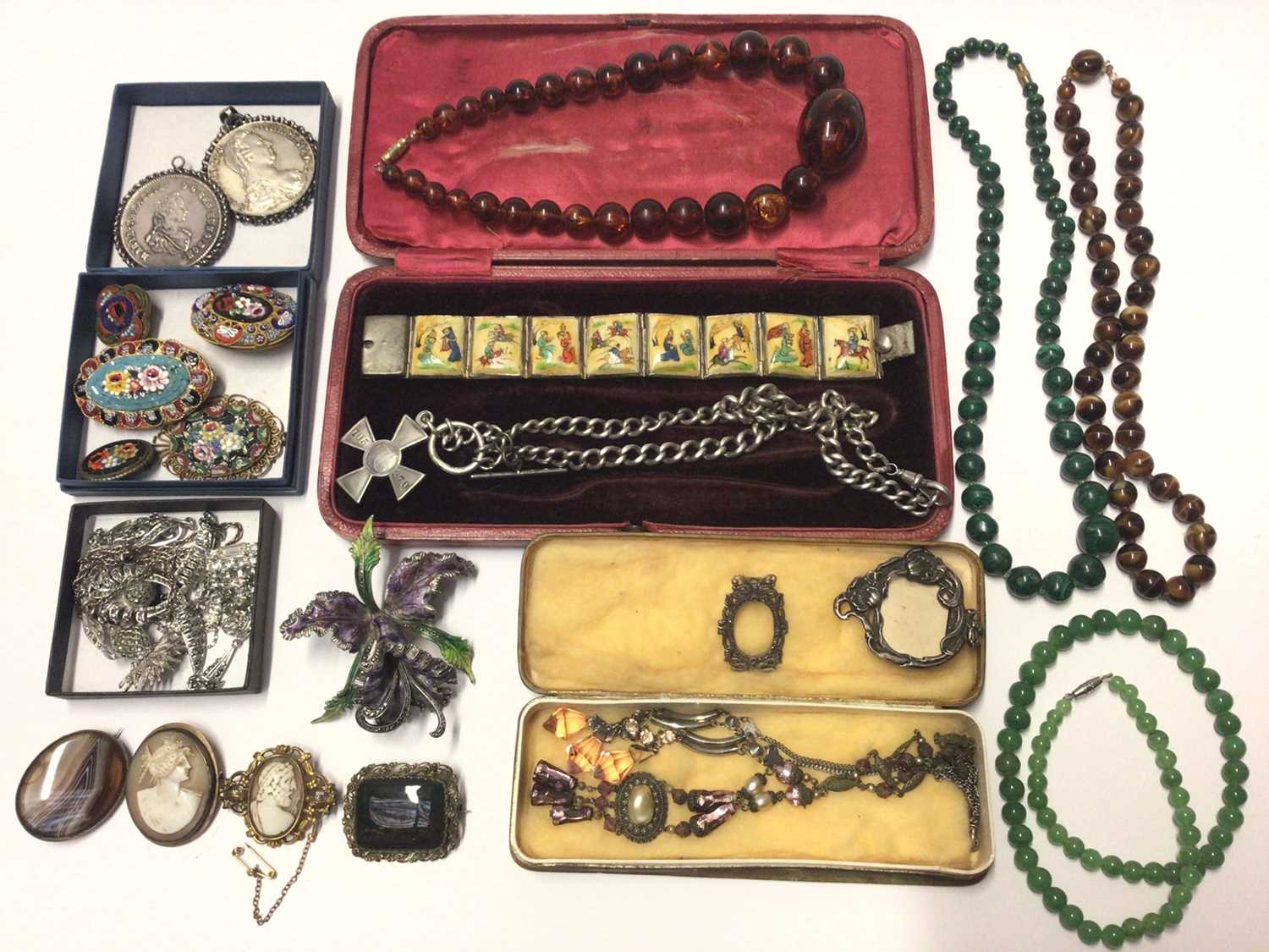 Lot 47 - Group of vintage costume jewellery to include a silver enamel and marcasite orchid brooch, Edwardian silver watch chain, two miniature silver photograph frames, two silver coin pendants, bead neckl...