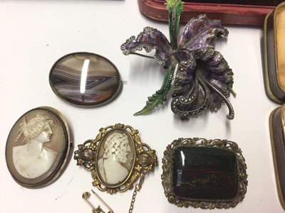 Lot 47 - Group of vintage costume jewellery to include a silver enamel and marcasite orchid brooch, Edwardian silver watch chain, two miniature silver photograph frames, two silver coin pendants, bead neckl...