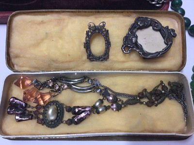 Lot 47 - Group of vintage costume jewellery to include a silver enamel and marcasite orchid brooch, Edwardian silver watch chain, two miniature silver photograph frames, two silver coin pendants, bead neckl...