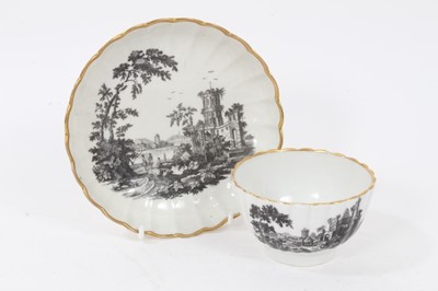 Lot 103 - A Worcester fluted tea bowl and saucer, printed with ruins, circa 1770
