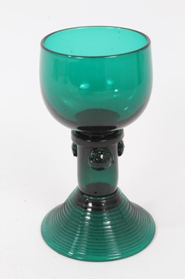 Lot 114 - A George III green tinted wine glass, in German style