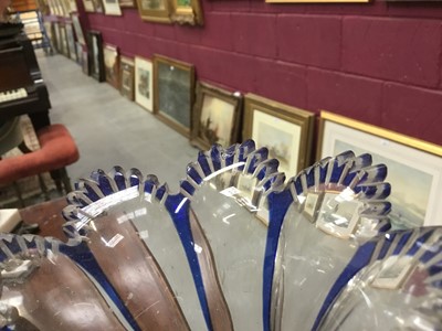 Lot 188 - A pair of mid 19th century Bohemian blue flash glass cornucopia, on parcel gilt bronze and marble bases