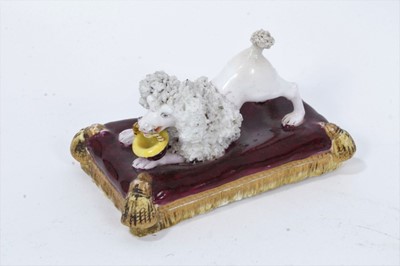 Lot 174 - A Minton model of a begging poodle, circa 1840