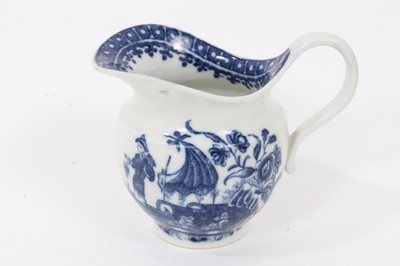 Lot 160 - An unusual Caughley helmet shaped milk jug, printed in blue with the Fisherman and Cormorant pattern, circa 1785