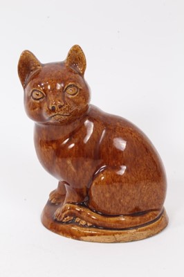 Lot 173 - A lead glazed stoneware model of a cat, circa 1820