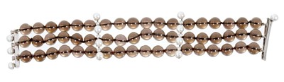Lot 462 - Diamond, smokey quartz and cultured pearl bracelet