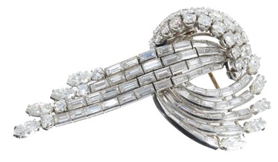 Lot 410 - Diamond brooch with a stylized scroll and waterfall design with articulated tassel drops, with brilliant cut, marquise cut and baguette cut diamonds in 18ct white gold setting. Estimated total diam...