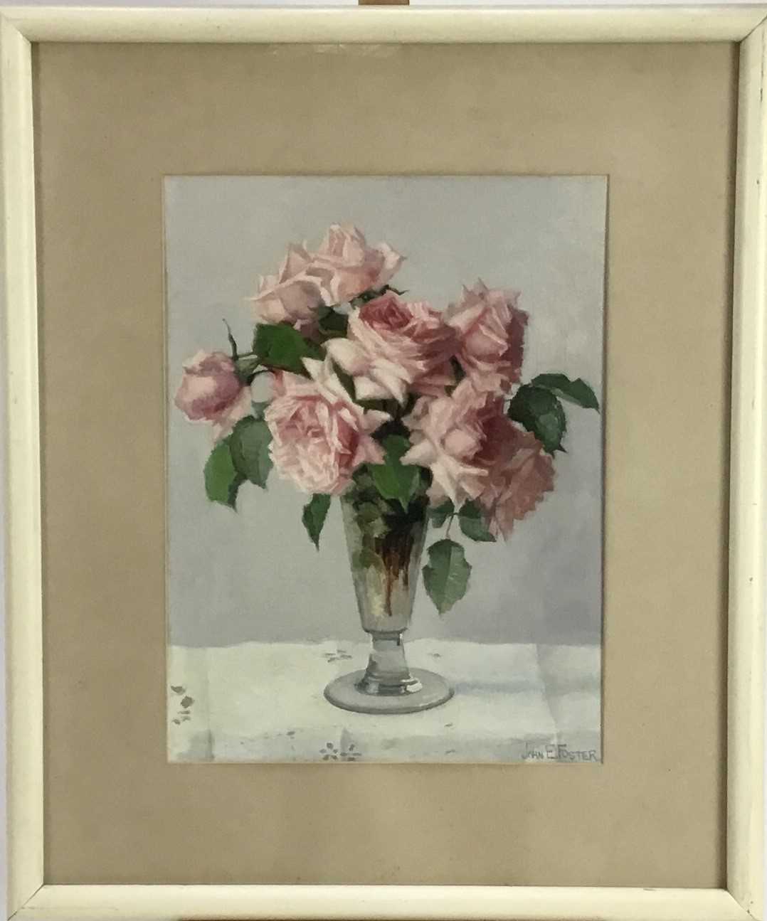 Lot 64 - John Ernest Foster (1877-1965) oil - roses in a glass vase, 30cm x 40cm