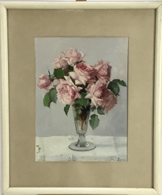 Lot 64 - John Ernest Foster (1877-1965) oil - roses in a glass vase, 30cm x 40cm