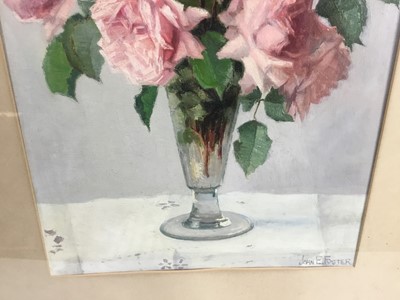 Lot 64 - John Ernest Foster (1877-1965) oil - roses in a glass vase, 30cm x 40cm