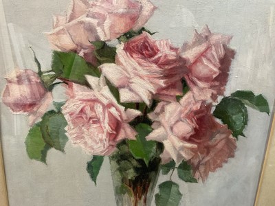 Lot 64 - John Ernest Foster (1877-1965) oil - roses in a glass vase, 30cm x 40cm