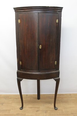 Lot 1285 - George III oak and crossbanded corner cupboard