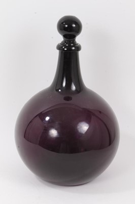Lot 32 - Antique aubergine glass pharmacy bottle and stopper