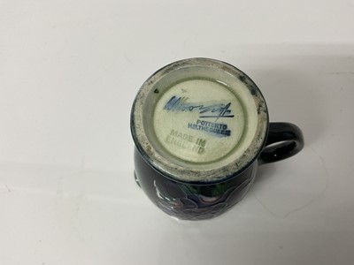 Lot 1098 - Moorcroft pottery poppy pattern teapot with sugar bowl and milk jug