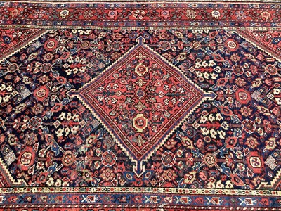Lot 1432 - Persian rug with central lozenge medallion