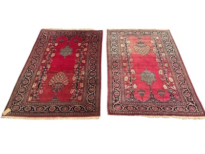 Lot 1291 - Fine pair of pink ground Pakistani Kashan design rugs