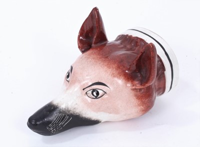 Lot 194 - Victorian Staffordshire pottery stirrup cup in the form of a Fox