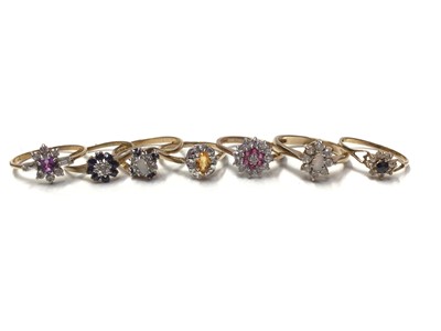 Lot 23 - Seven 9ct gold gem set cluster rings