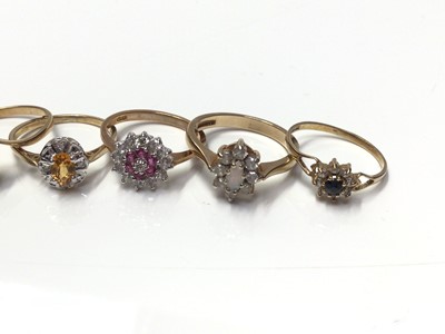 Lot 23 - Seven 9ct gold gem set cluster rings