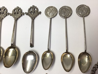 Lot 34 - Collection of silver and plated military related teaspoons, WWII pocket watch, chain, silver fobs etc