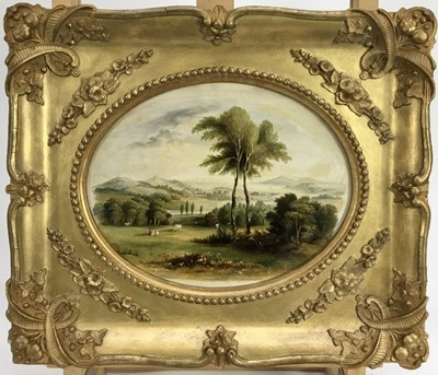 Lot 183 - English School late 19th Century, oil on artist board, An oval of an extensive landscape with cattle near trees in the foreground, in original gilt frame. 19 x 23cm.
