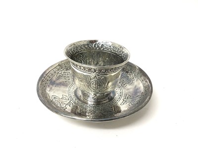 Lot 212 - Antique Tibetan silver tea bowl and saucer