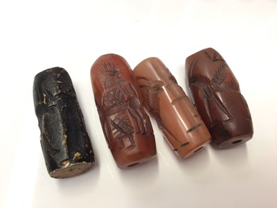 Lot 42 - Collection of Chinese carved carnelian tubular beads and others