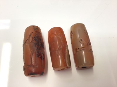 Lot 42 - Collection of Chinese carved carnelian tubular beads and others