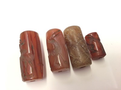 Lot 42 - Collection of Chinese carved carnelian tubular beads and others